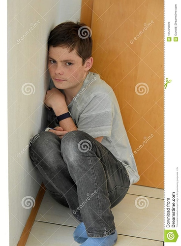 depressed-boy-hidden-corner-room-sad-teenage-hiding-105529079