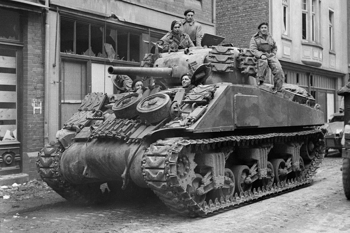 A_Sherman_tank_of_8th_Armoured_Brigade_in_Kevelaer_Germany_4_March_1945._B15145-5ee92fd41e4040bab305638b2f6b8fcf